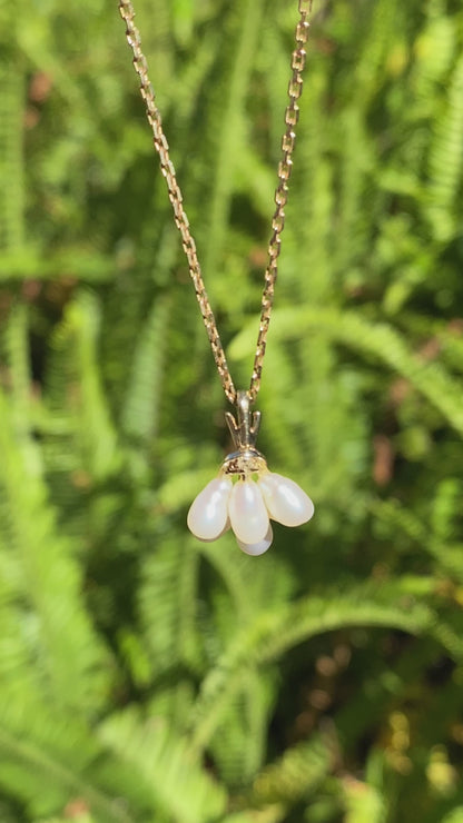 9K gold pearl 'tassel' and diamond pendant.