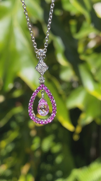 18K gold pink sapphire and diamond pendant.