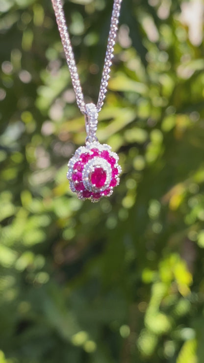 18K gold ruby and diamond pendant.