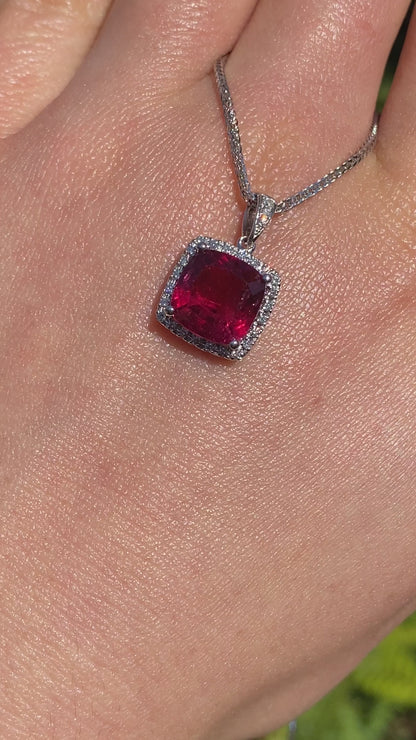 18K gold rubellite tourmaline and diamond pendant.