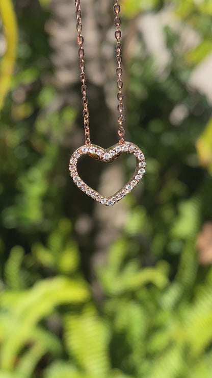 9K gold diamond heart pendant.