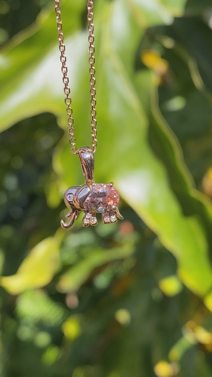 18K gold morganite and diamond elephant pendant.