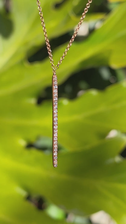 9K gold diamond bar necklace.
