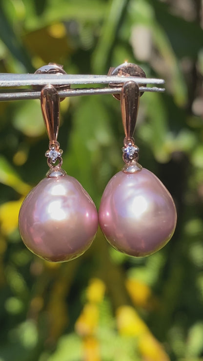 9K gold freshwater pearl and diamond dangle earrings.