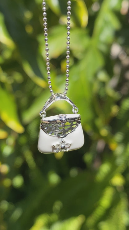 14K gold enamel and diamond handbag pendant.