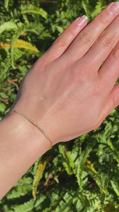 18K gold diamond bar bracelet.