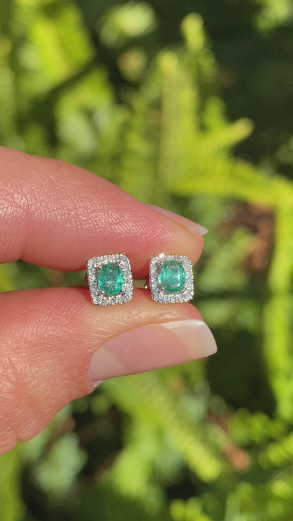 9K gold emerald and diamond earrings.