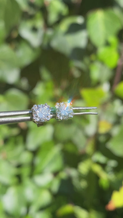 9K gold diamond studs.