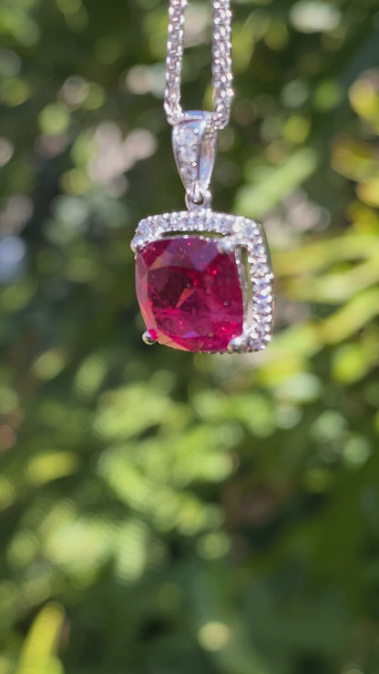 18K gold rubellite tourmaline and diamond pendant.