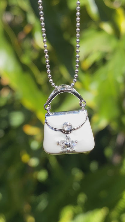 14K gold enamel and diamond handbag pendant.