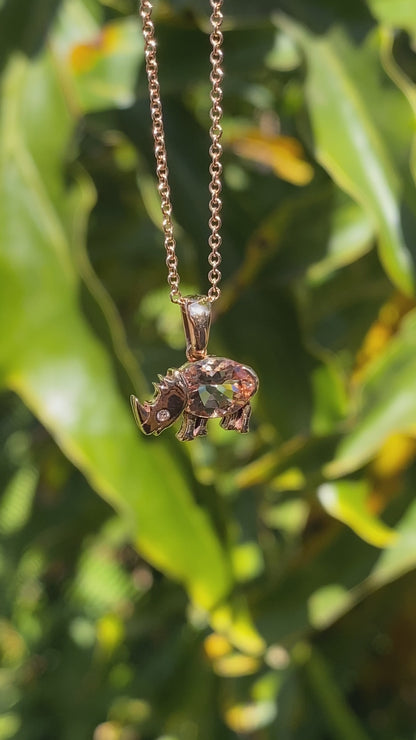 18K gold morganite and diamond rhino pendant.