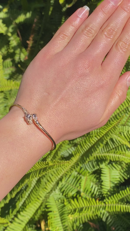 18K gold ruby and diamond leopard bangle.