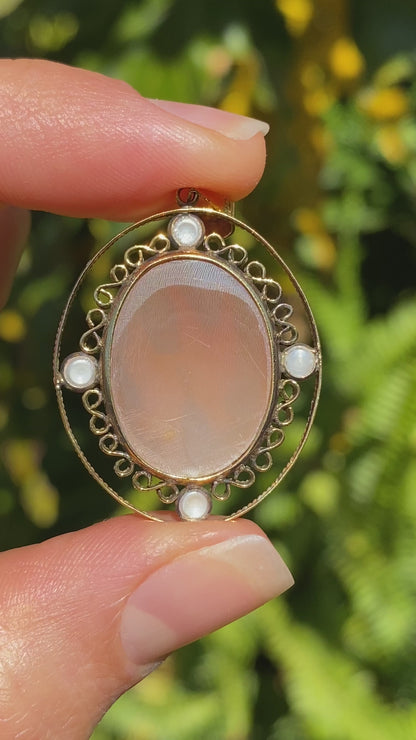 9K gold conch shell cameo and cultured akoya pearl pendant.