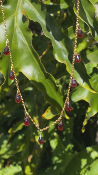 18K gold garnet necklace.