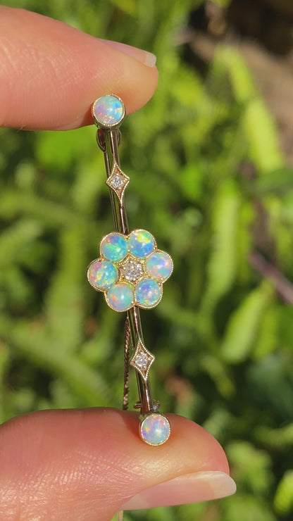 Edwardian 9K gold opal and diamond bar brooch, Circa 1905.
