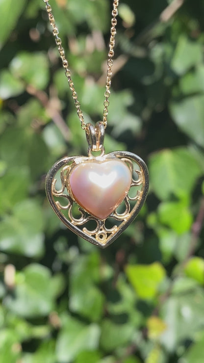 9K gold pink mabe pearl filigree heart pendant.