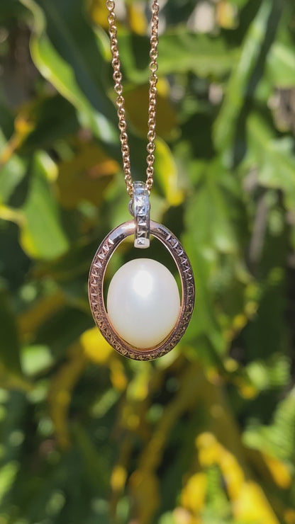 18K tri-gold freshwater pearl pendant with 18K gold chain.