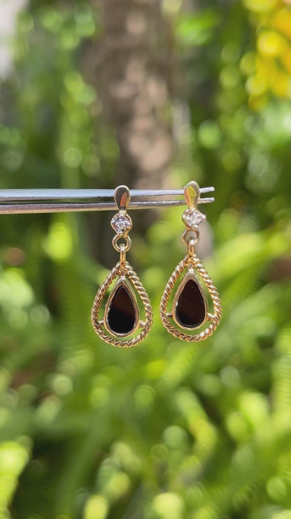 9K gold Vintage onyx and diamond dangle earrings, circa 1990's.