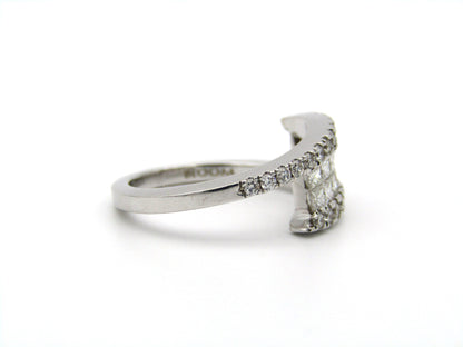 18K gold diamond ring.