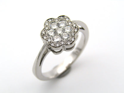 18K gold diamond flower ring.