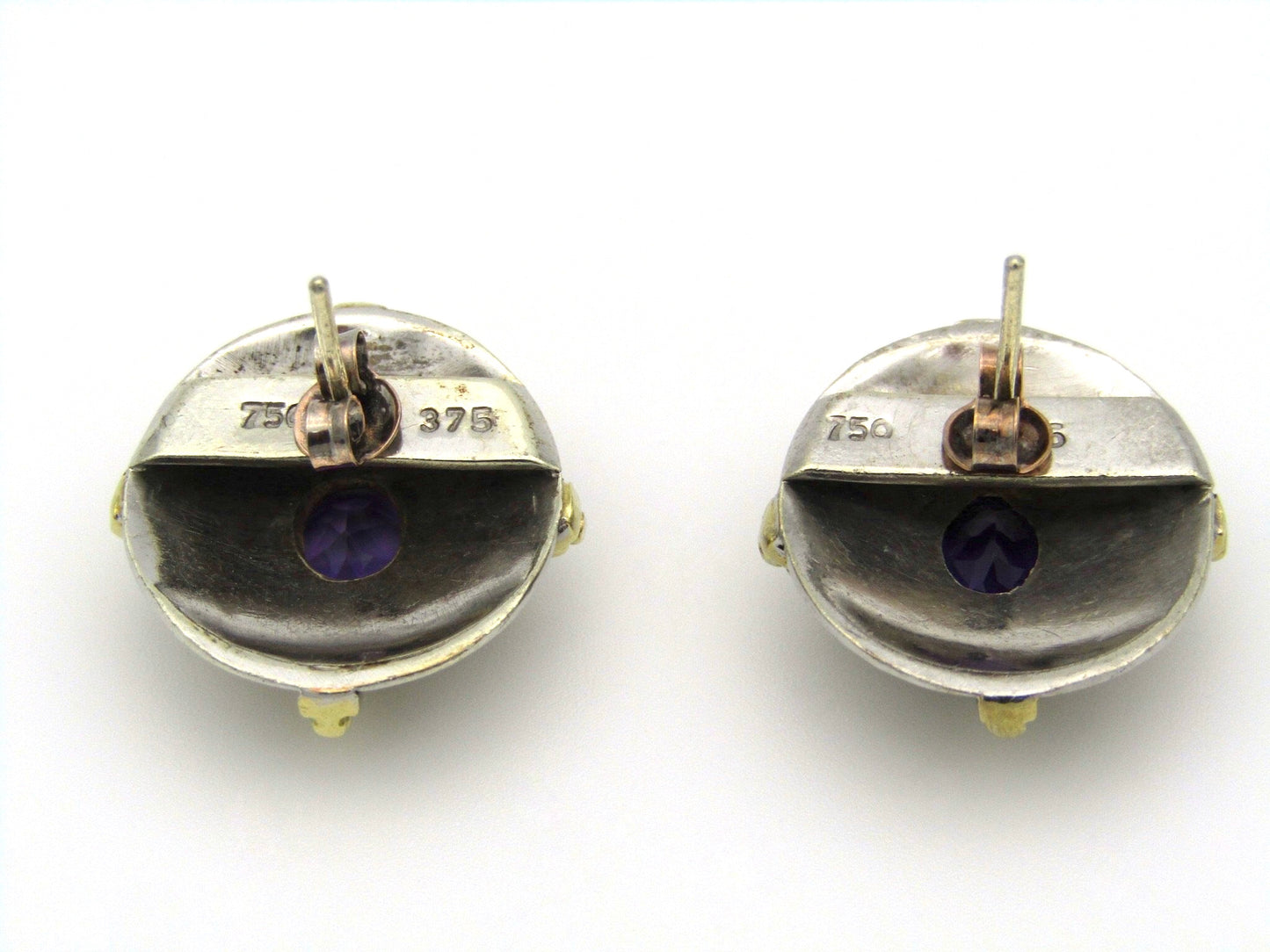 A pair of 18kt and 9kt gold amethyst earrings.