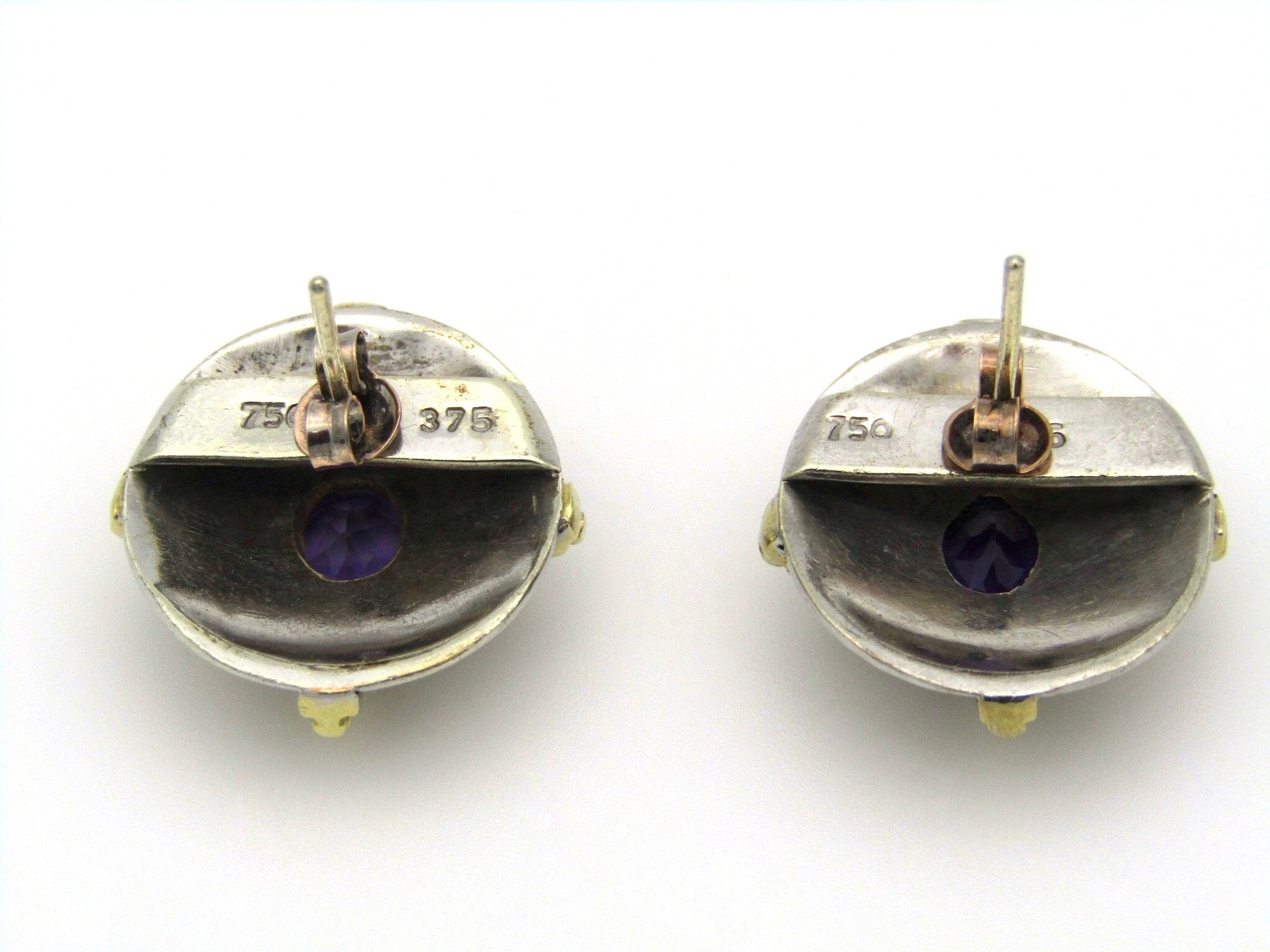 A pair of 18kt and 9kt gold amethyst earrings.