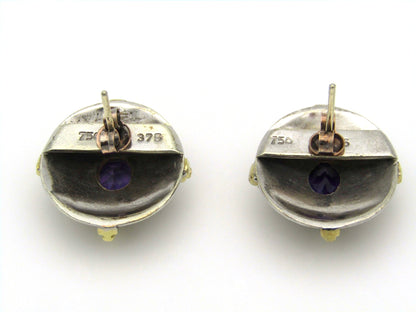 A pair of 18kt and 9kt gold amethyst earrings.