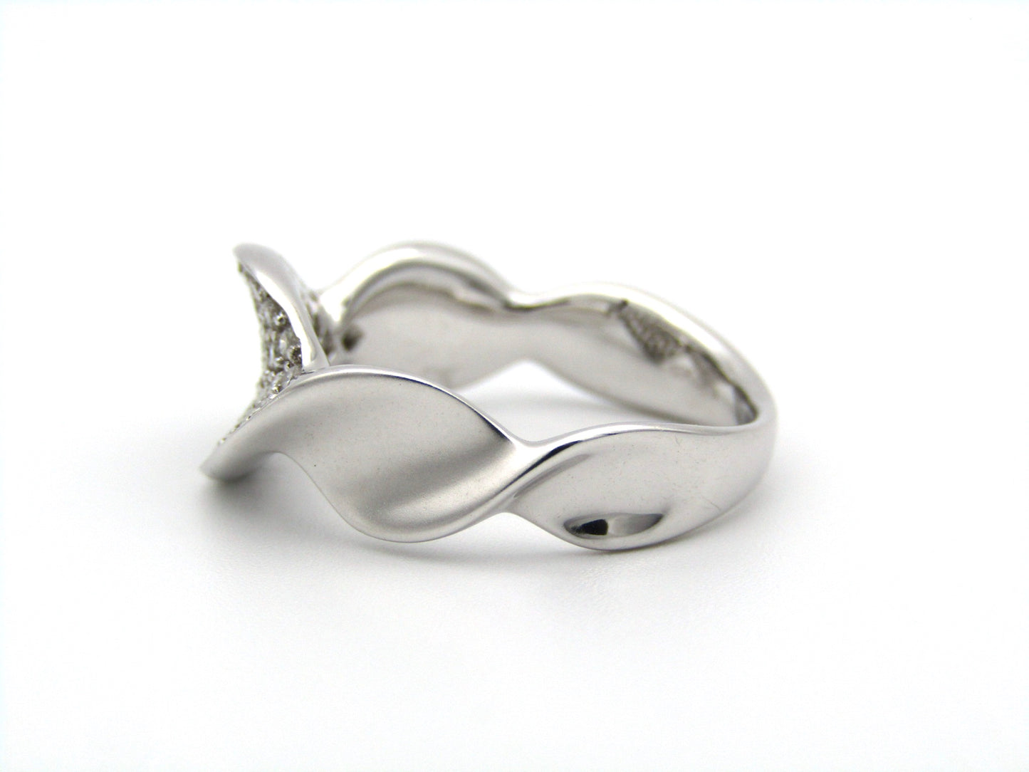 18K gold twist diamond ring.