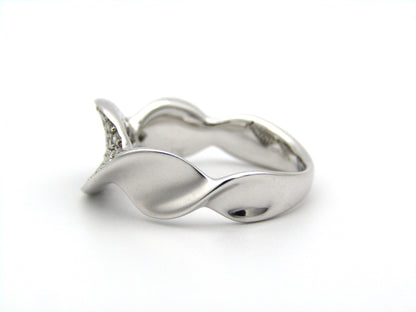 18K gold twist diamond ring.