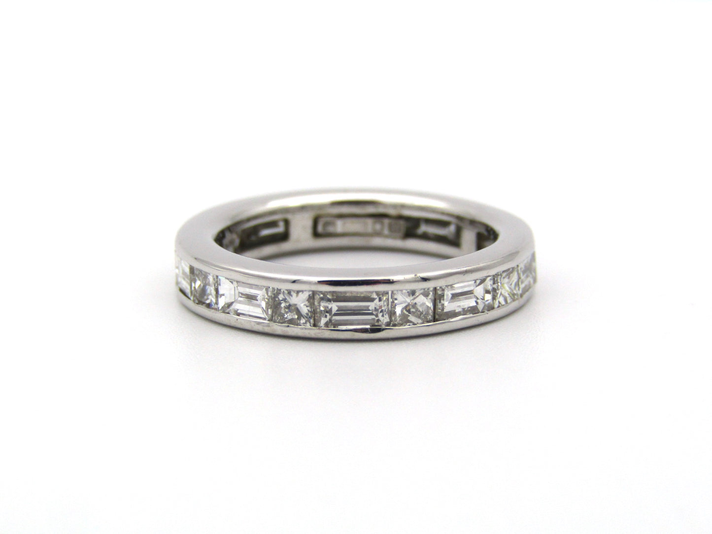 18K gold diamond eternity ring.