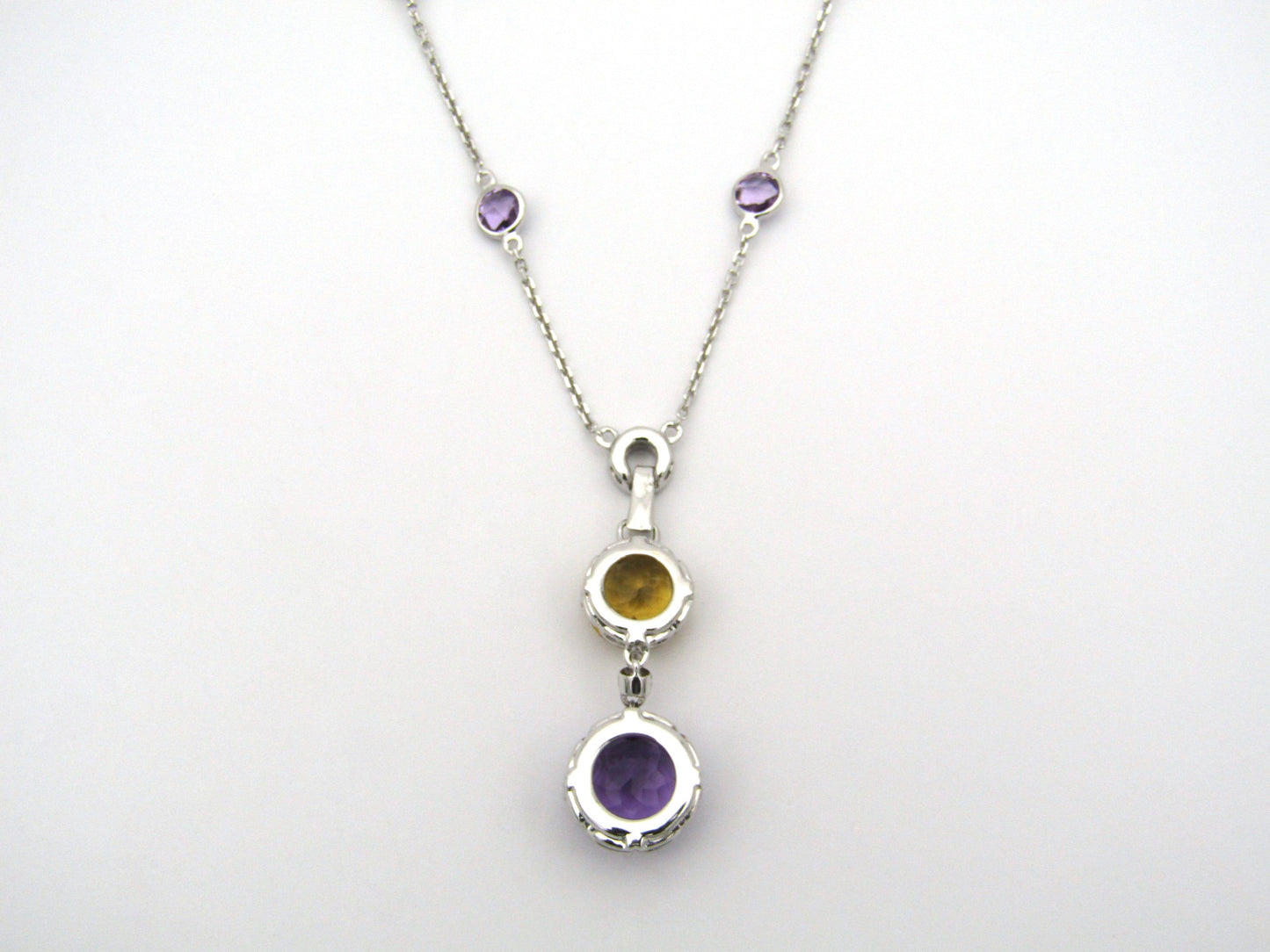 18K gold amethyst, citrine, and diamond necklace.