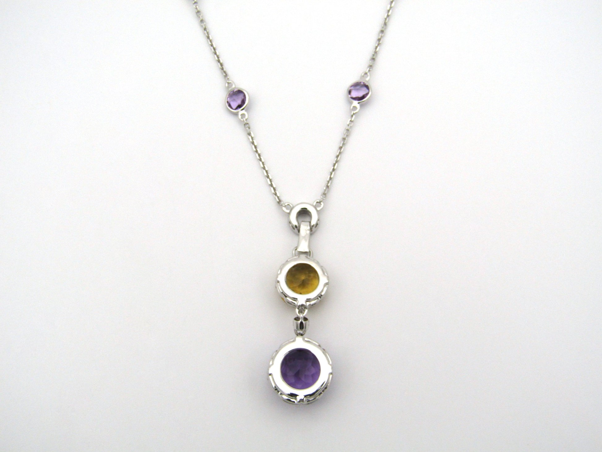 18K gold amethyst, citrine, and diamond necklace.