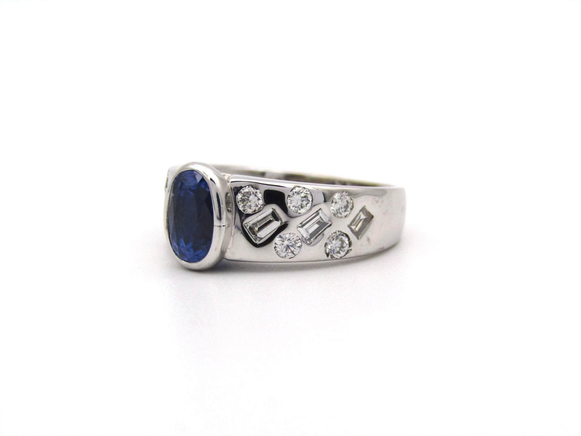 18K gold sapphire and diamond ring.