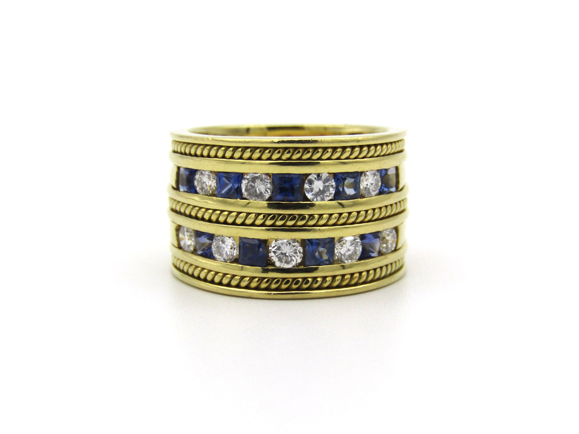 18K gold sapphire and diamond ring.