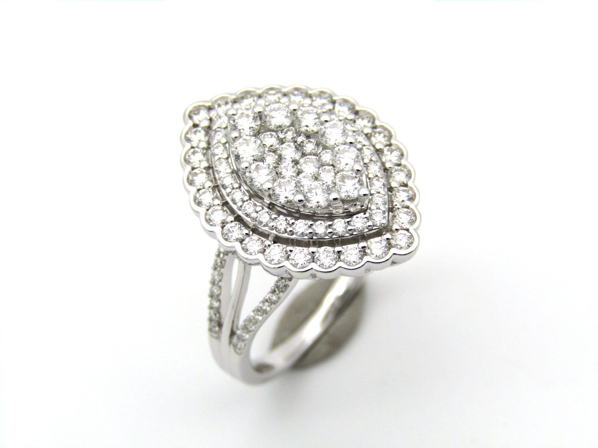 18K gold diamond cluster ring.