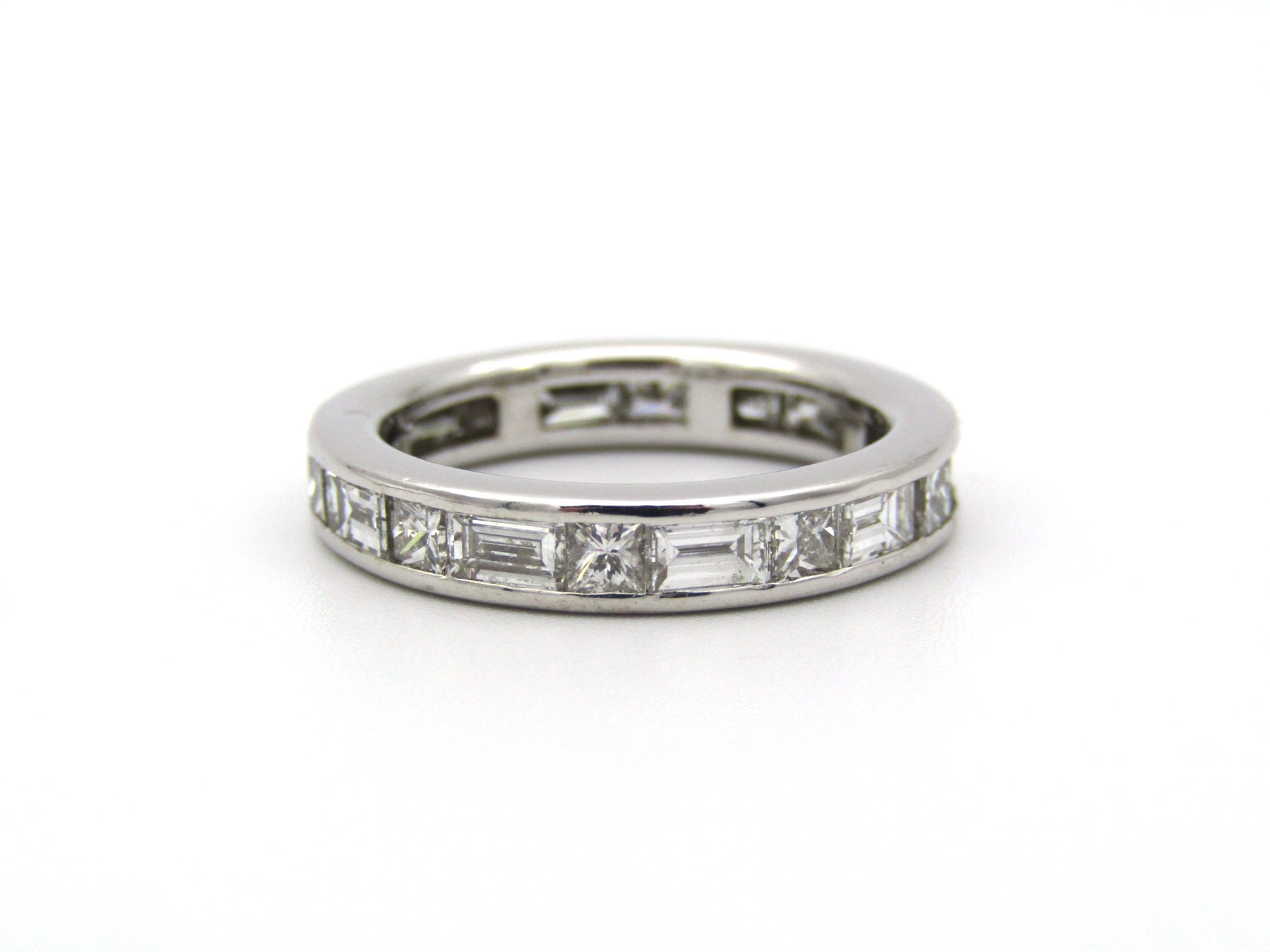 18K gold diamond eternity ring.