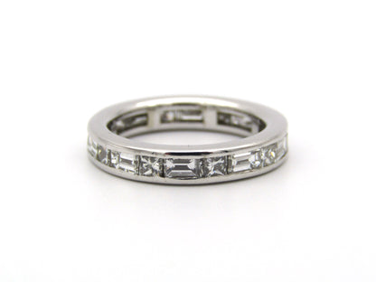 18K gold diamond eternity ring.
