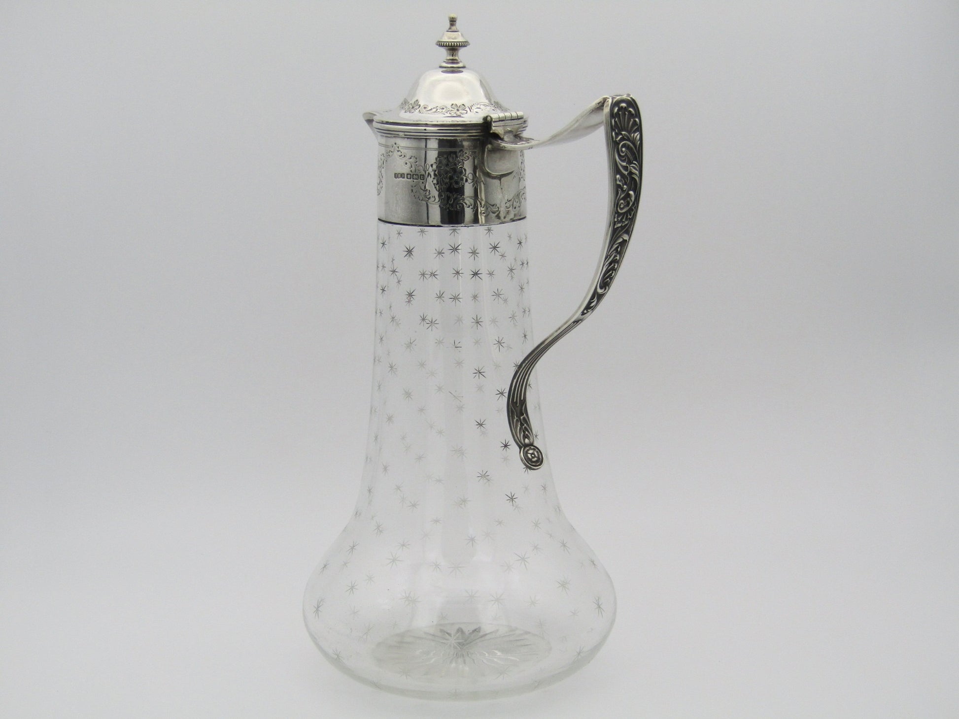 Sterling silver mounted cut glass claret jug by Thomas Henry Blake, Sheffield 1913.