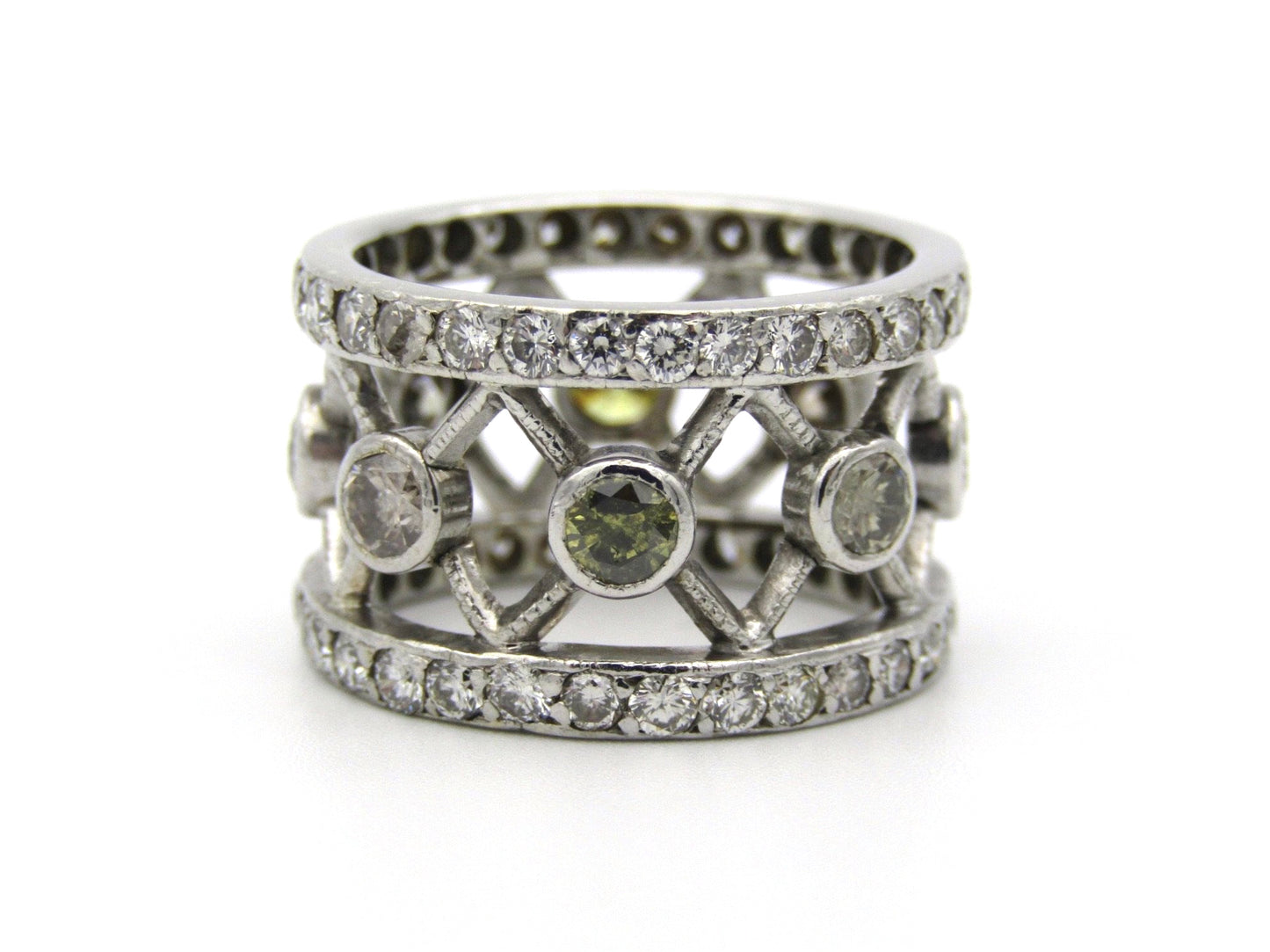 9kt gold fancy and colourless diamond ring.