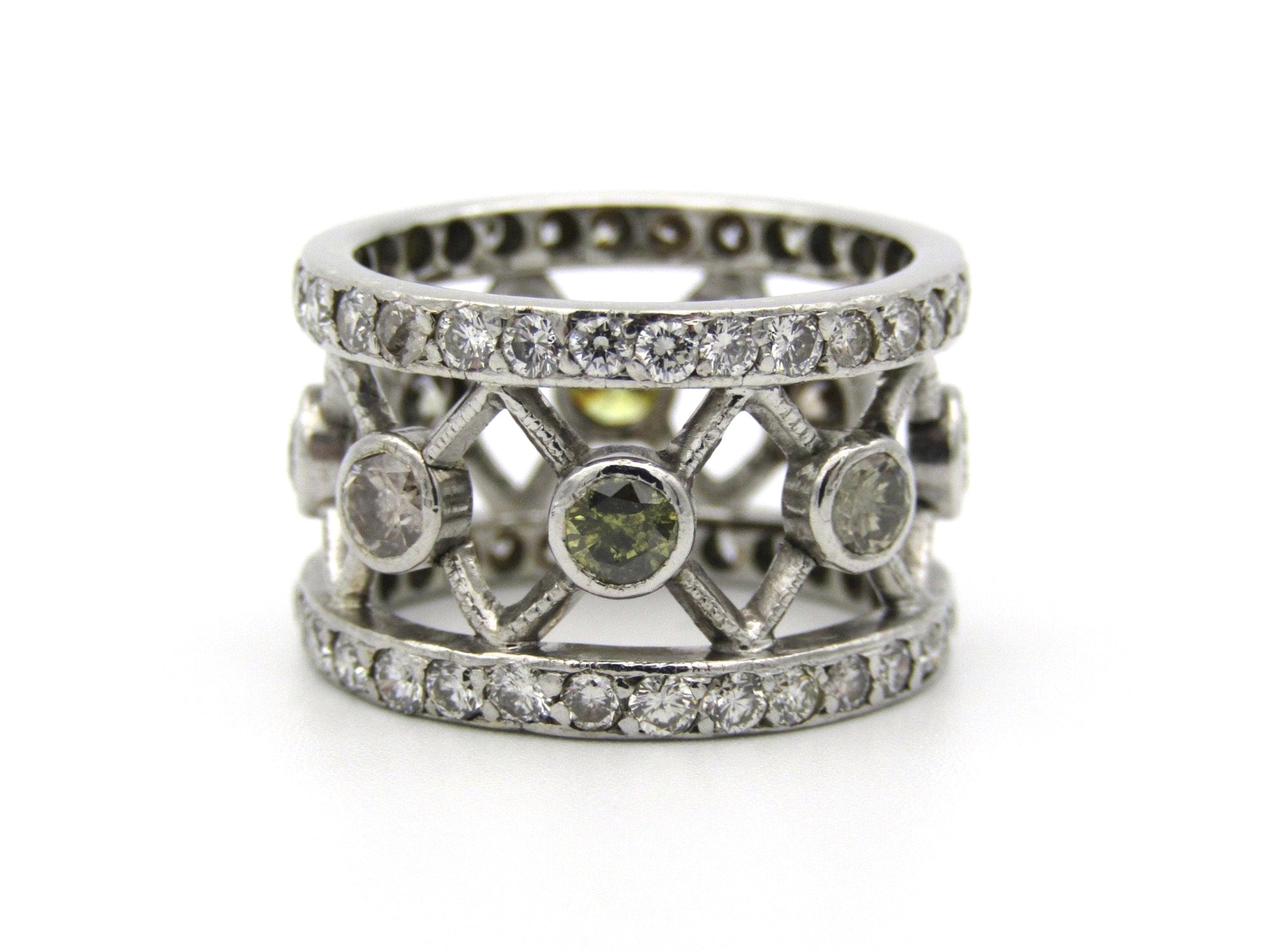 9kt gold fancy and colourless diamond ring.