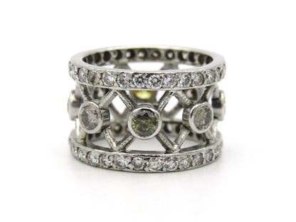 9kt gold fancy and colourless diamond ring.