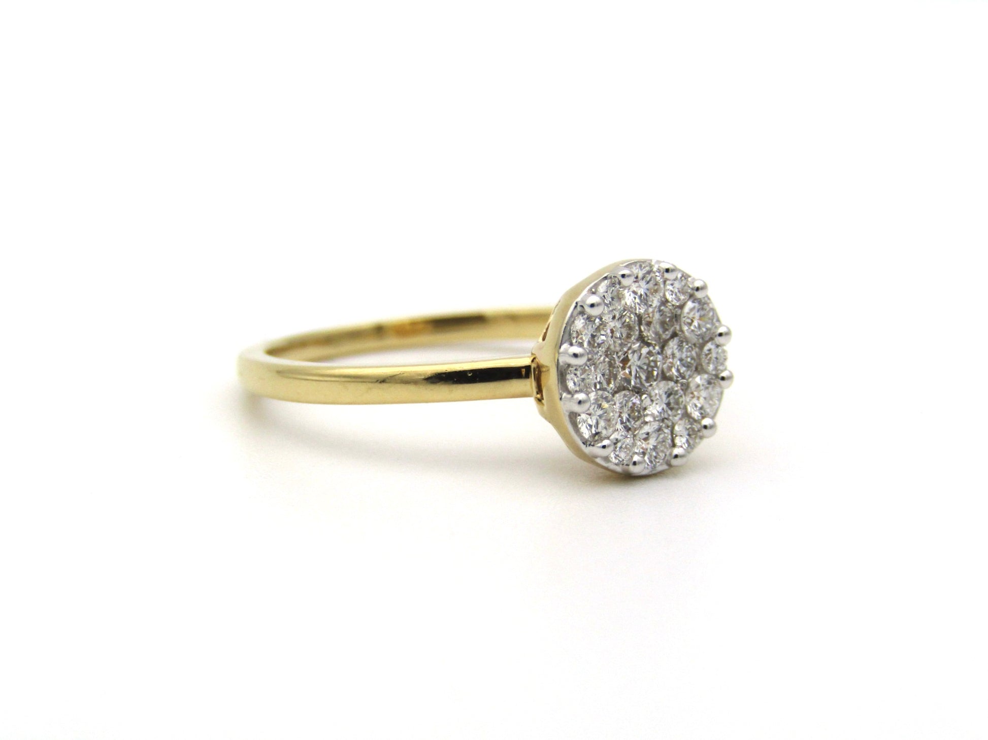 18K gold diamond cluster ring.