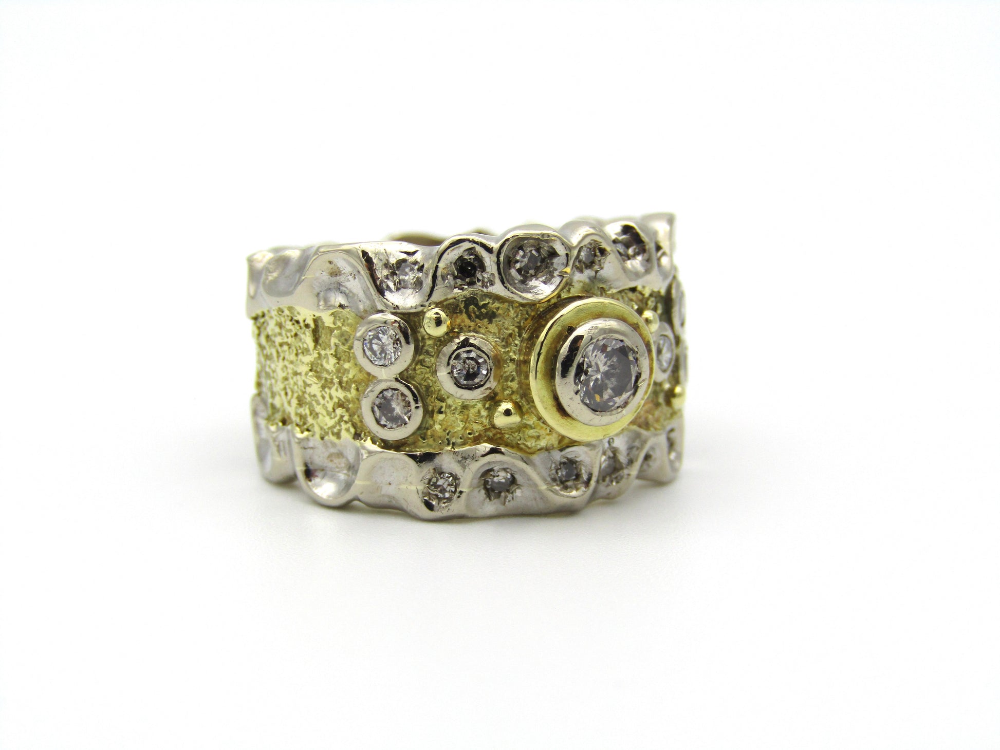 18kt gold diamond ring.