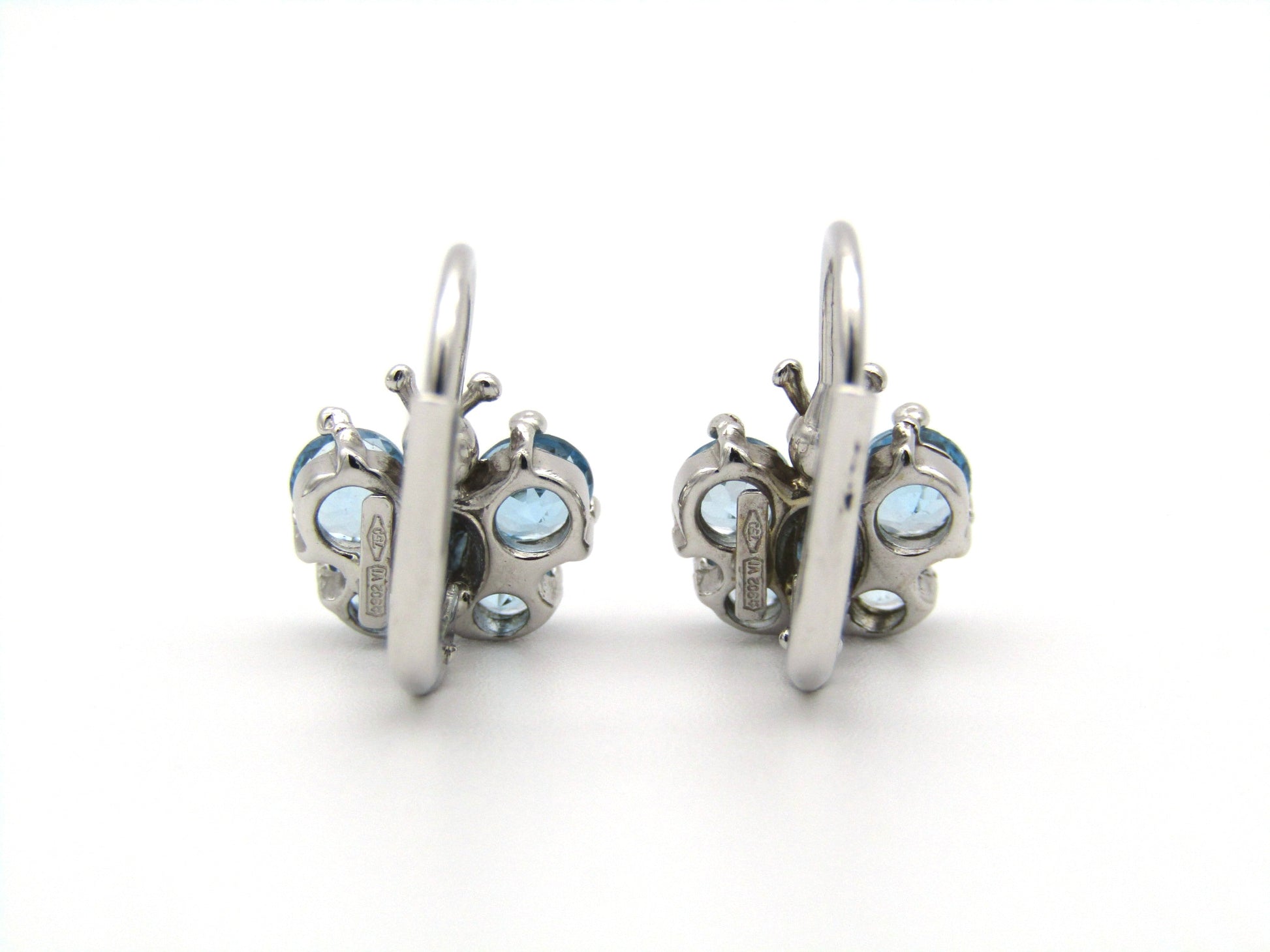 18K gold blue topaz butterfly earrings.