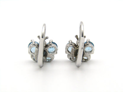 18K gold blue topaz butterfly earrings.
