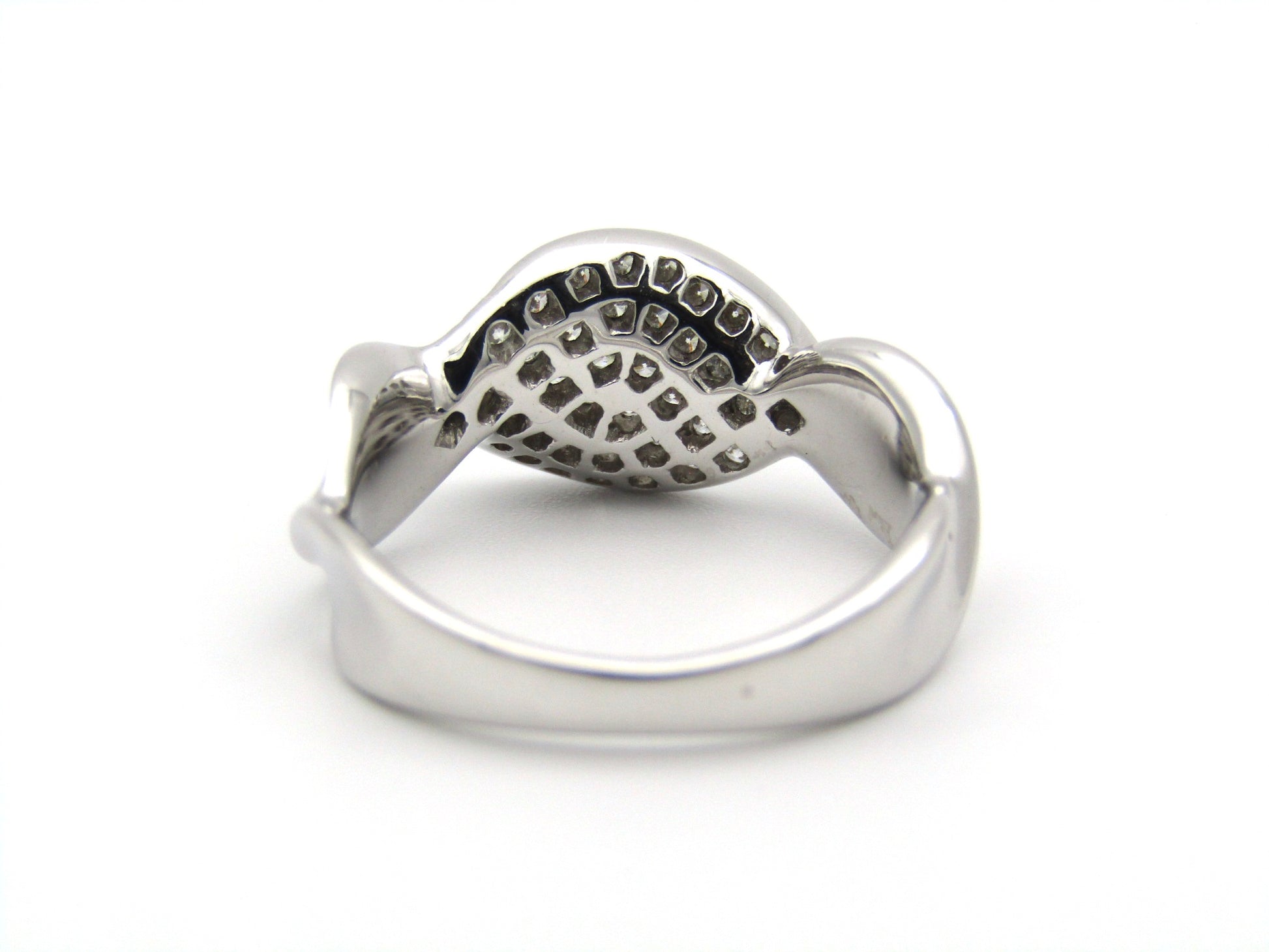 18K gold twist diamond ring.