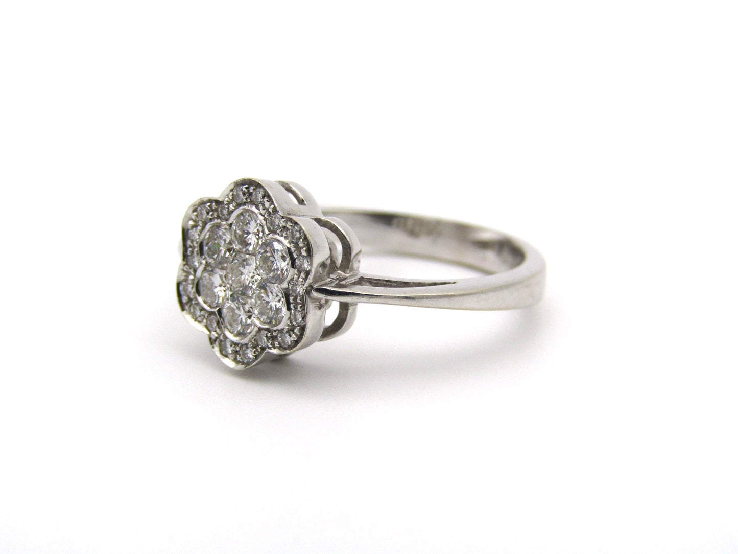 18K gold diamond flower ring.