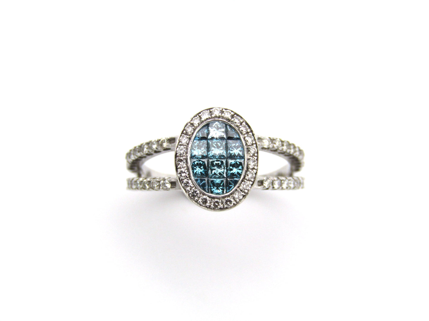 18K gold blue and colourless diamond ring.