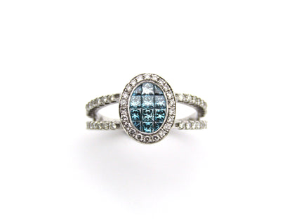 18K gold blue and colourless diamond ring.