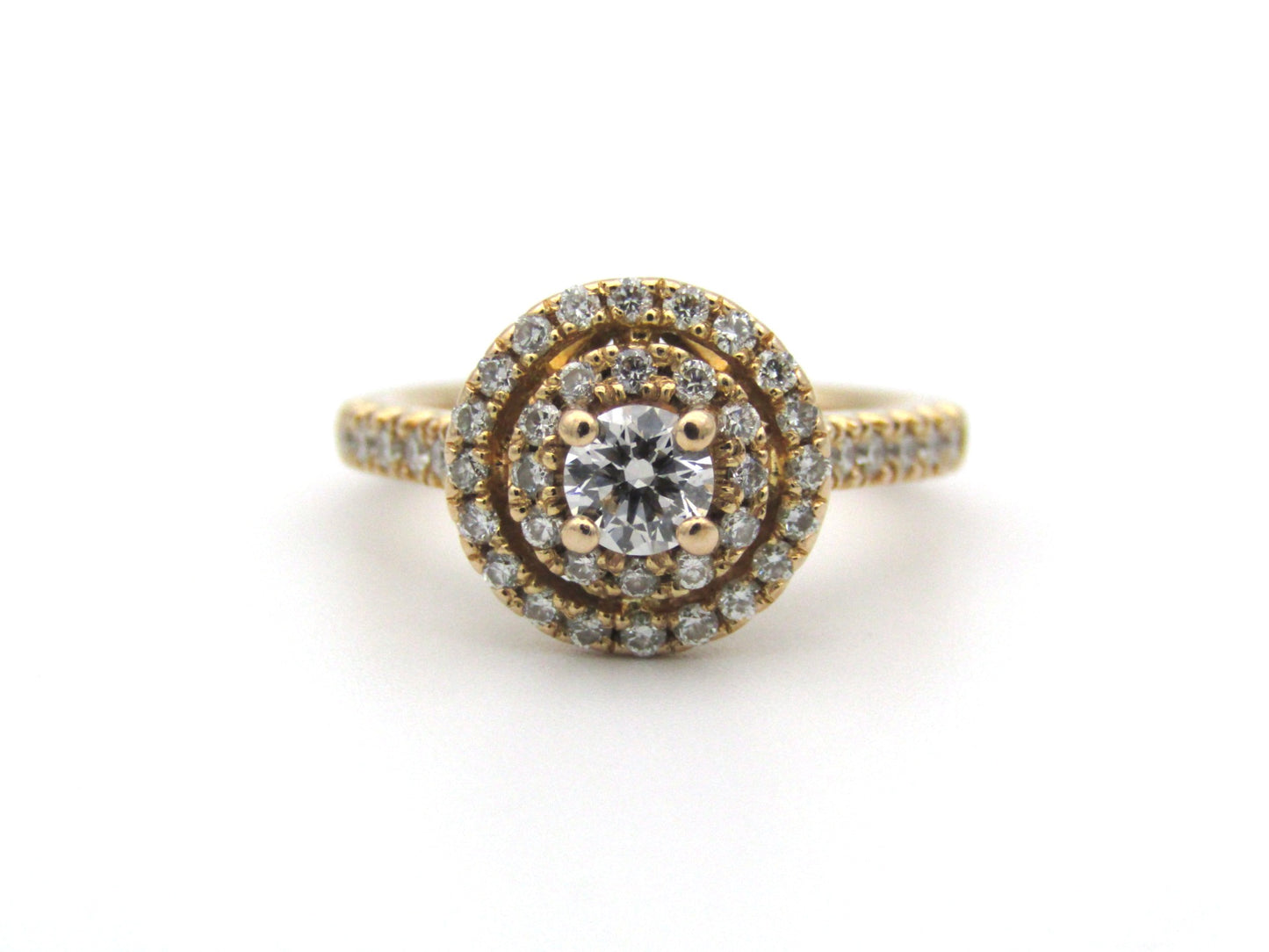 18K gold diamond halo ring.